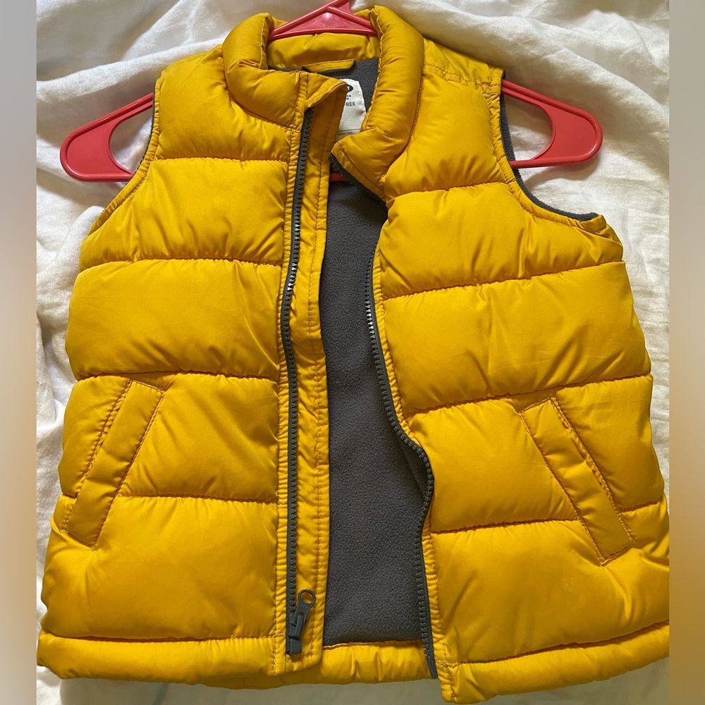 Boys yellow old navy puffer vest, worn but lots of life left. Size 5T $15
